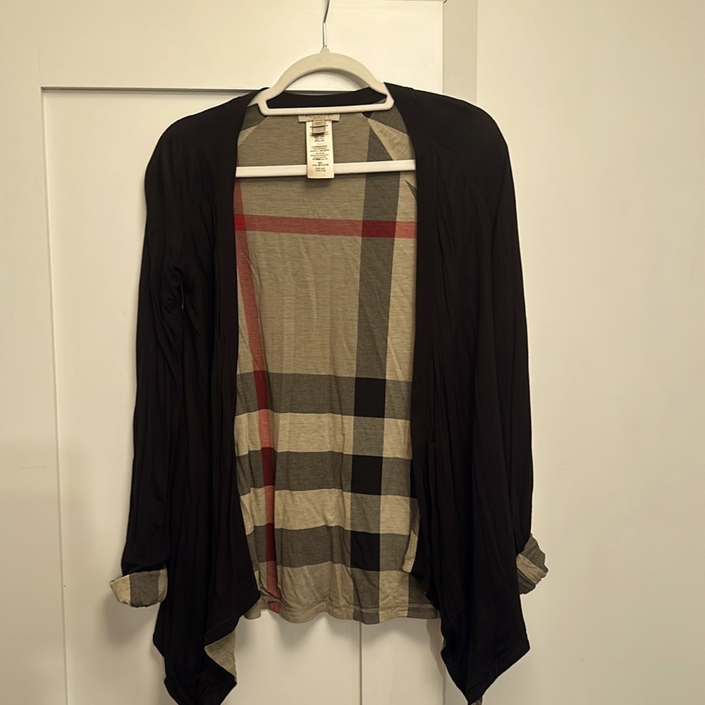 Black Burberry cardigan with classic Burberry print on the inside. Worn 5 times!